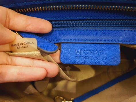 michael kors purse made in china e-1302|michael kors bag serial number lookup.